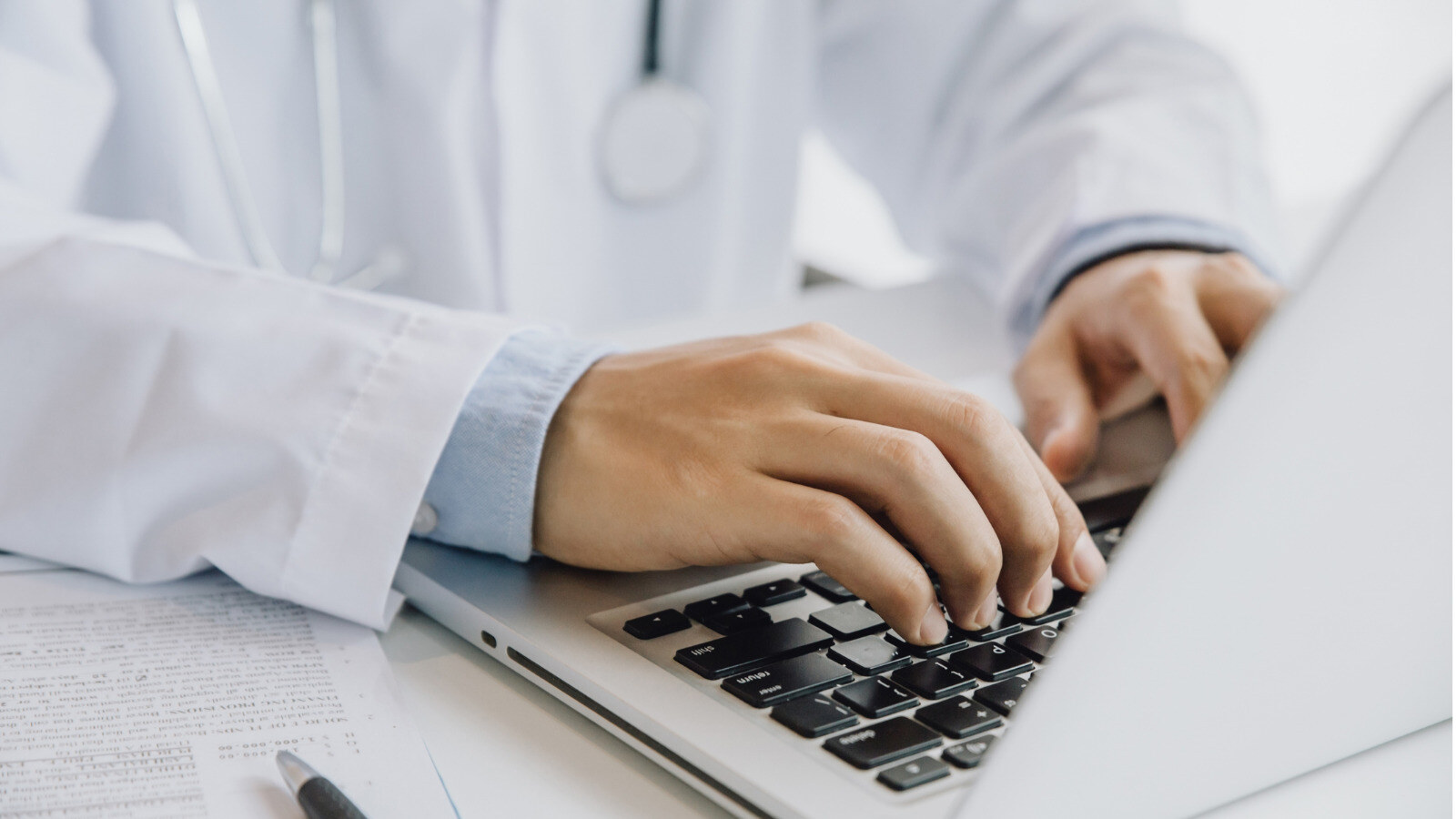 close-up-of-male-doctor-typing-on-laptop-computer-while-sitting-at-the-table-medical-staff.jpg_s=1024x1024&w=is&k=20&c=h407kSqOOPlx30lra0L6F772oIwplH_2RAIIllLDwng=(2)