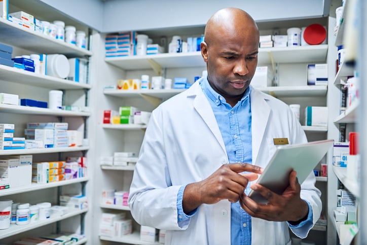 pharmacist on a tablet device