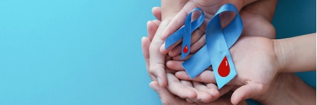 light-blue-ribbons-with-blood-on-blue-background-world-diabetes-day-picture-id1173495247
